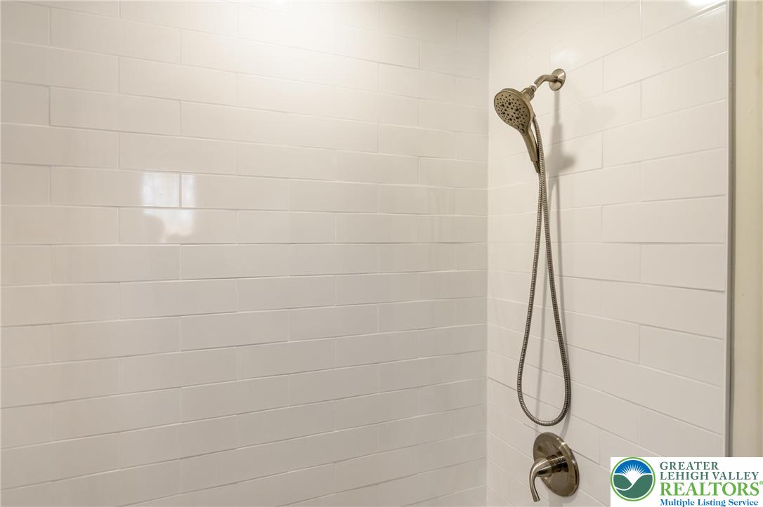 2206 Chatham Court Bushkill, PA 18324 - Photo 14 of 45 a bathroom with a shower