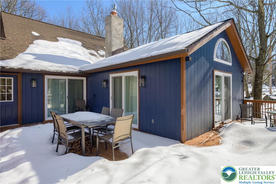 2206 Chatham Court Bushkill, PA 18324 - Photo 31 of 45 a view of a dinning table and chairs in the patio