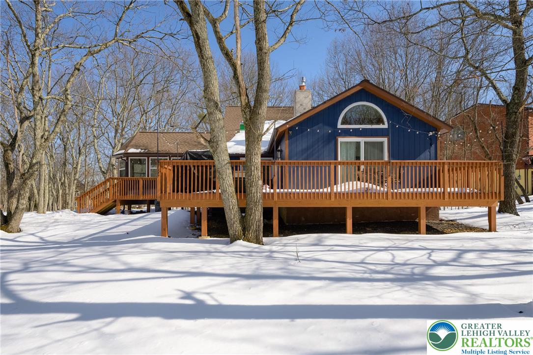2206 Chatham Court Bushkill, PA 18324 - Photo 34 of 45 a front view of house with large trees