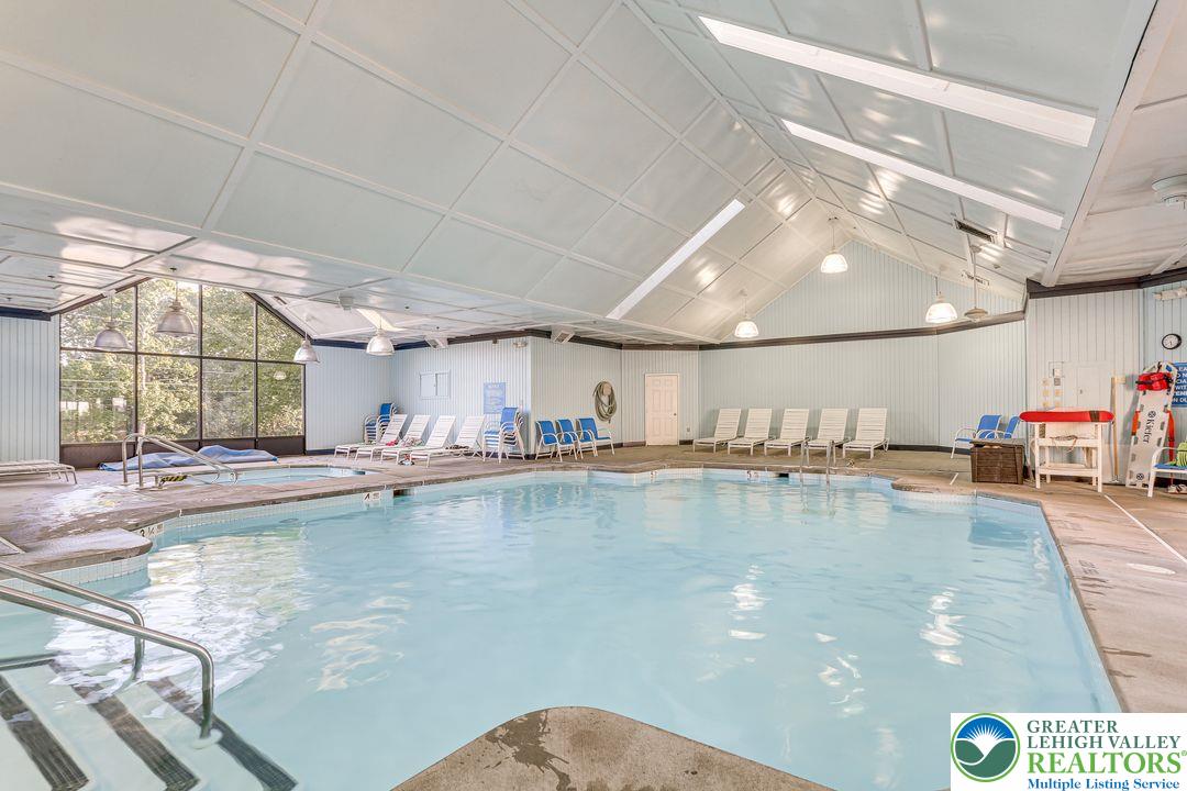 2206 Chatham Court Bushkill, PA 18324 - Photo 40 of 45 a view of a swimming pool and window