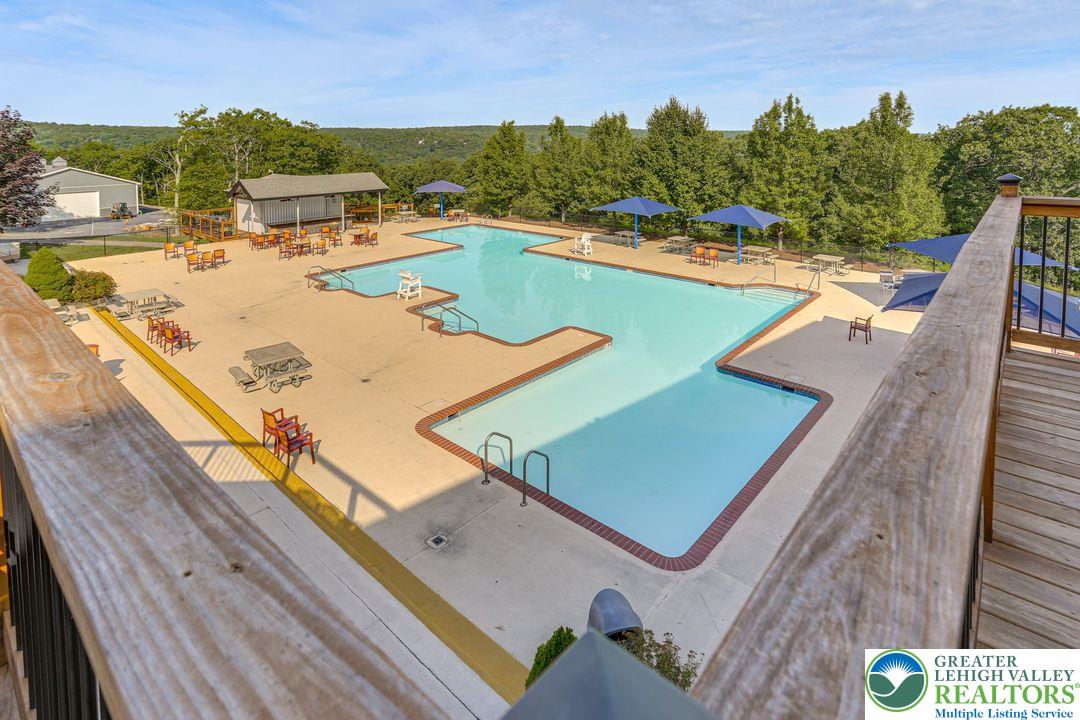 2206 Chatham Court Bushkill, PA 18324 - Photo 42 of 45 a view of a swimming pool with a patio