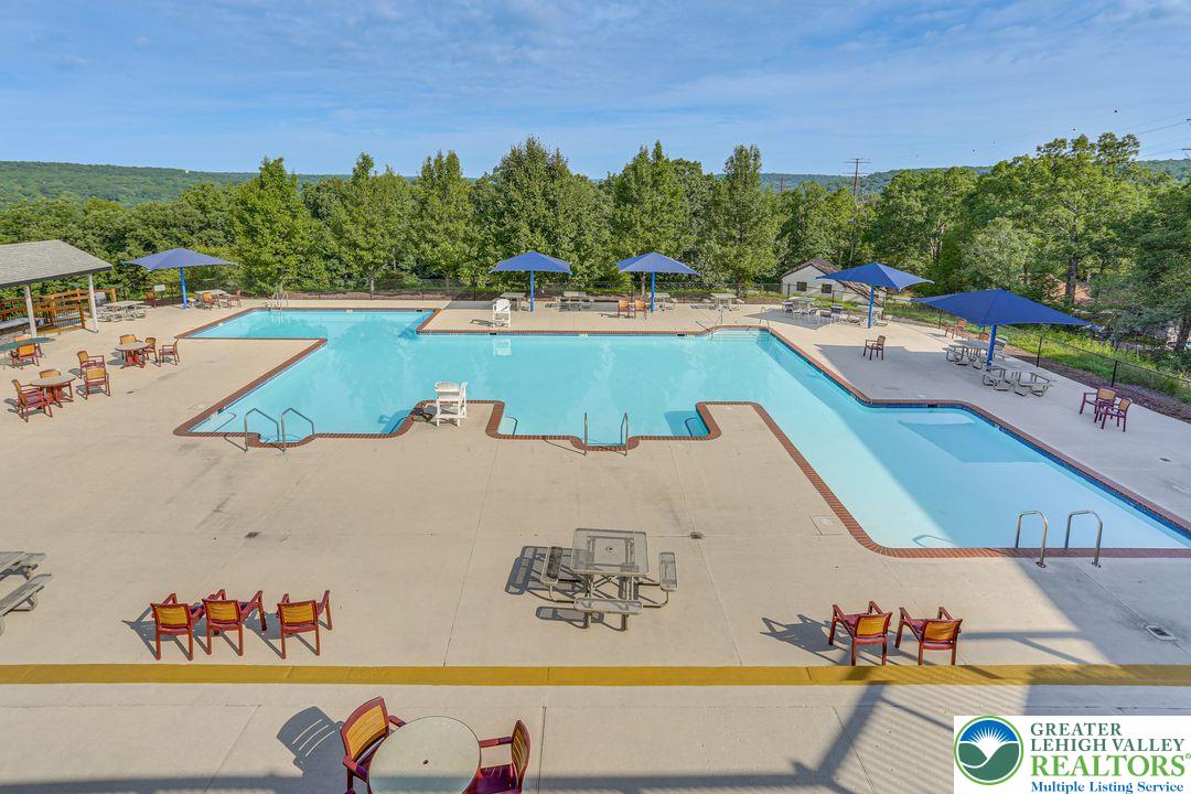 2206 Chatham Court Bushkill, PA 18324 - Photo 43 of 45 a view of a swimming pool with an outdoor seating