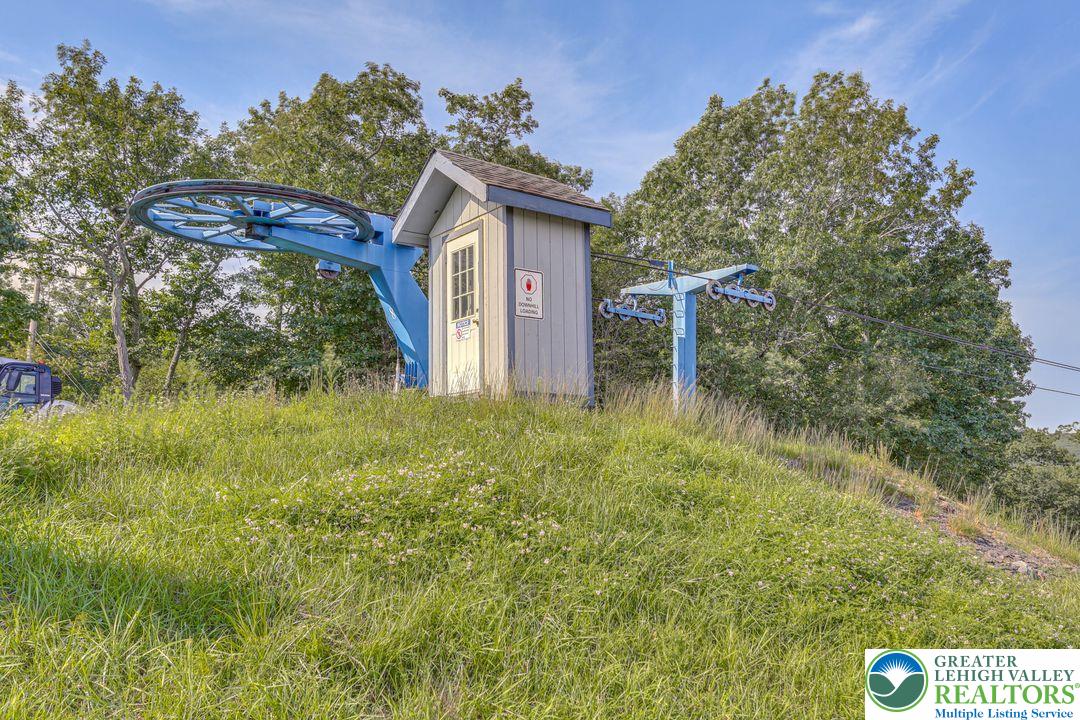 2206 Chatham Court Bushkill, PA 18324 - Photo 44 of 45 a view of a house with a yard