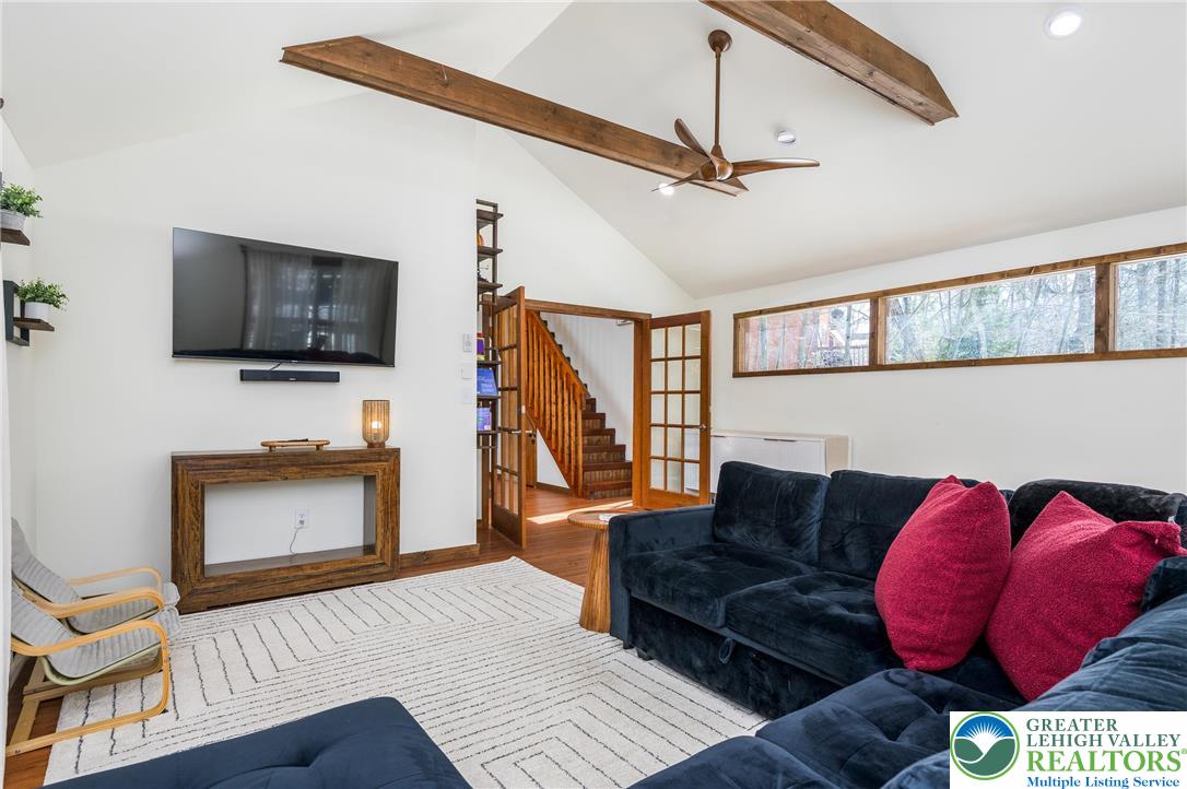 2206 Chatham Court Bushkill, PA 18324 - Photo 10 of 45 a living room with furniture and a flat screen tv
