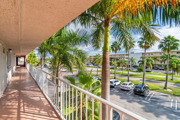 a view of a small yard from a balcony
