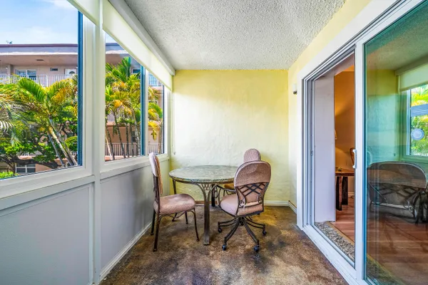 a view of a yard and patio