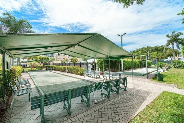 a view of a terrace with sitting area