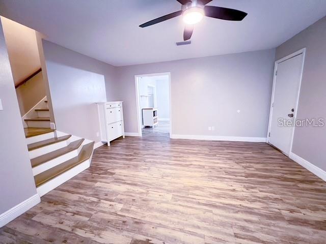 1928 Lawson Road Tallahassee, FL 32308 - Photo 13 of 20 wooden floor in an empty room with a window