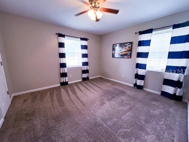 1928 Lawson Road Tallahassee, FL 32308 - Photo 7 of 20 a view of a livingroom with a large window