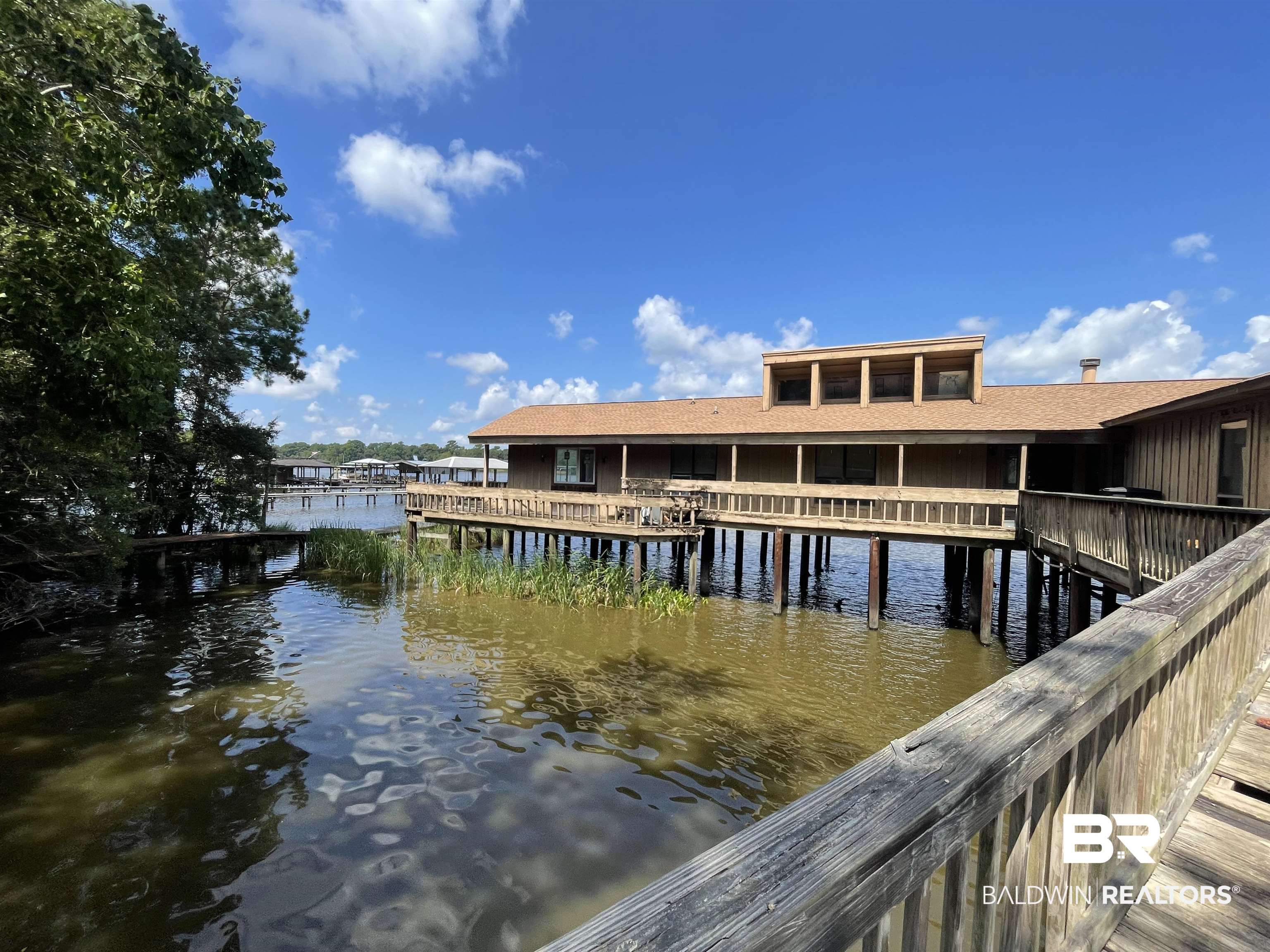3074 Riverside Drive West Mobile, AL 36605 - Photo 2 of 15 Dock area featuring a water view