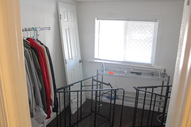 a view of a bathroom with a sink and a window