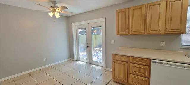 a view of cabinets and window