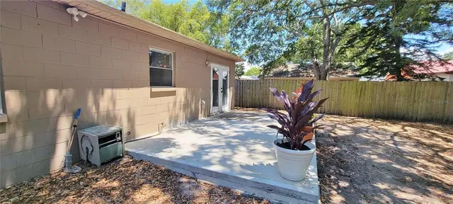 a view of a backyard of the house