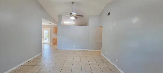 a view of a hallway with a chandelier