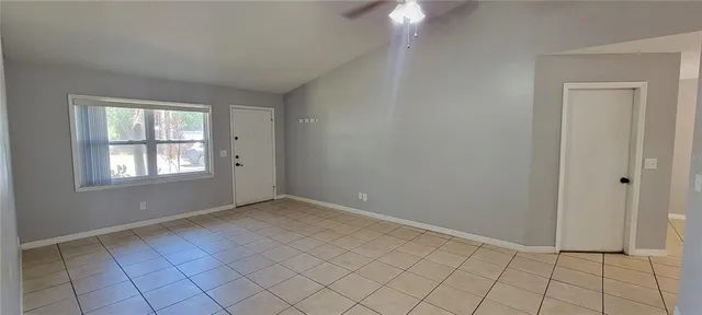 an empty room with windows