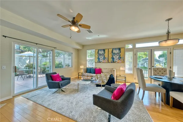 a living room with furniture or couch and a large window