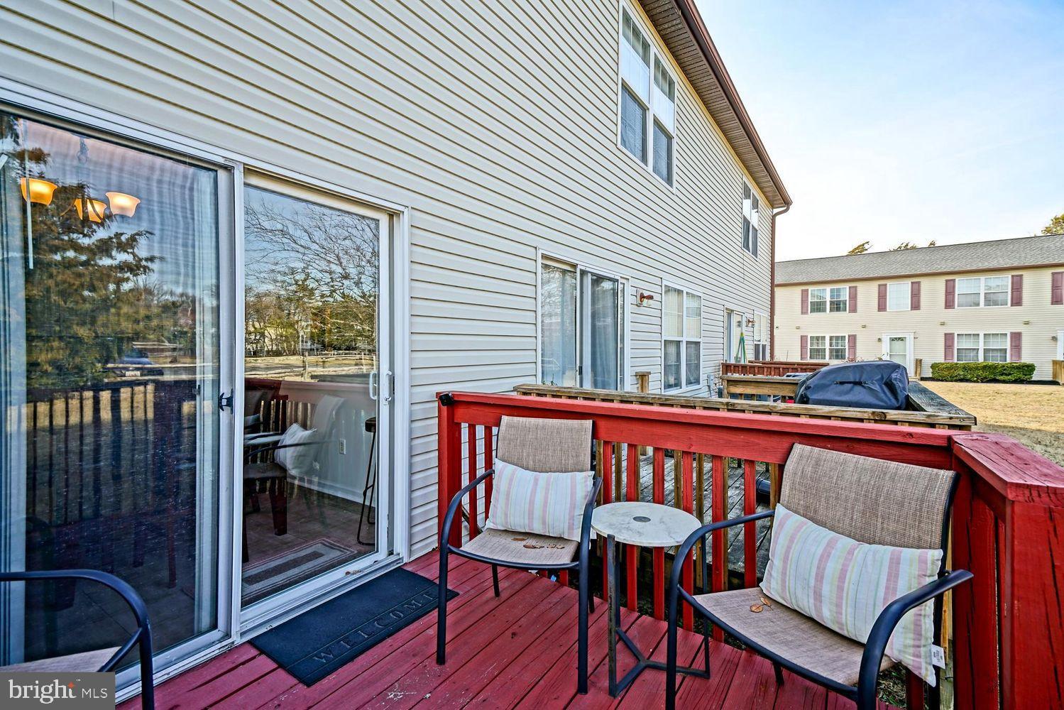 34531 Oakley Court, Unit 27 Lewes, DE 19958 - Photo 23 of 25 a outdoor view with a sitting space