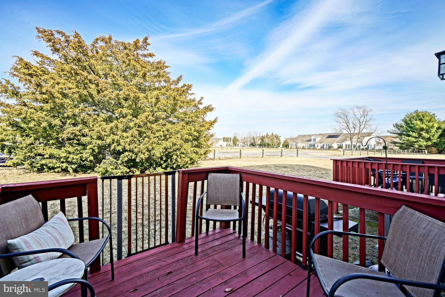 34531 Oakley Court, Unit 27 Lewes, DE 19958 - Photo 24 of 25 a view of a balcony with wooden floor