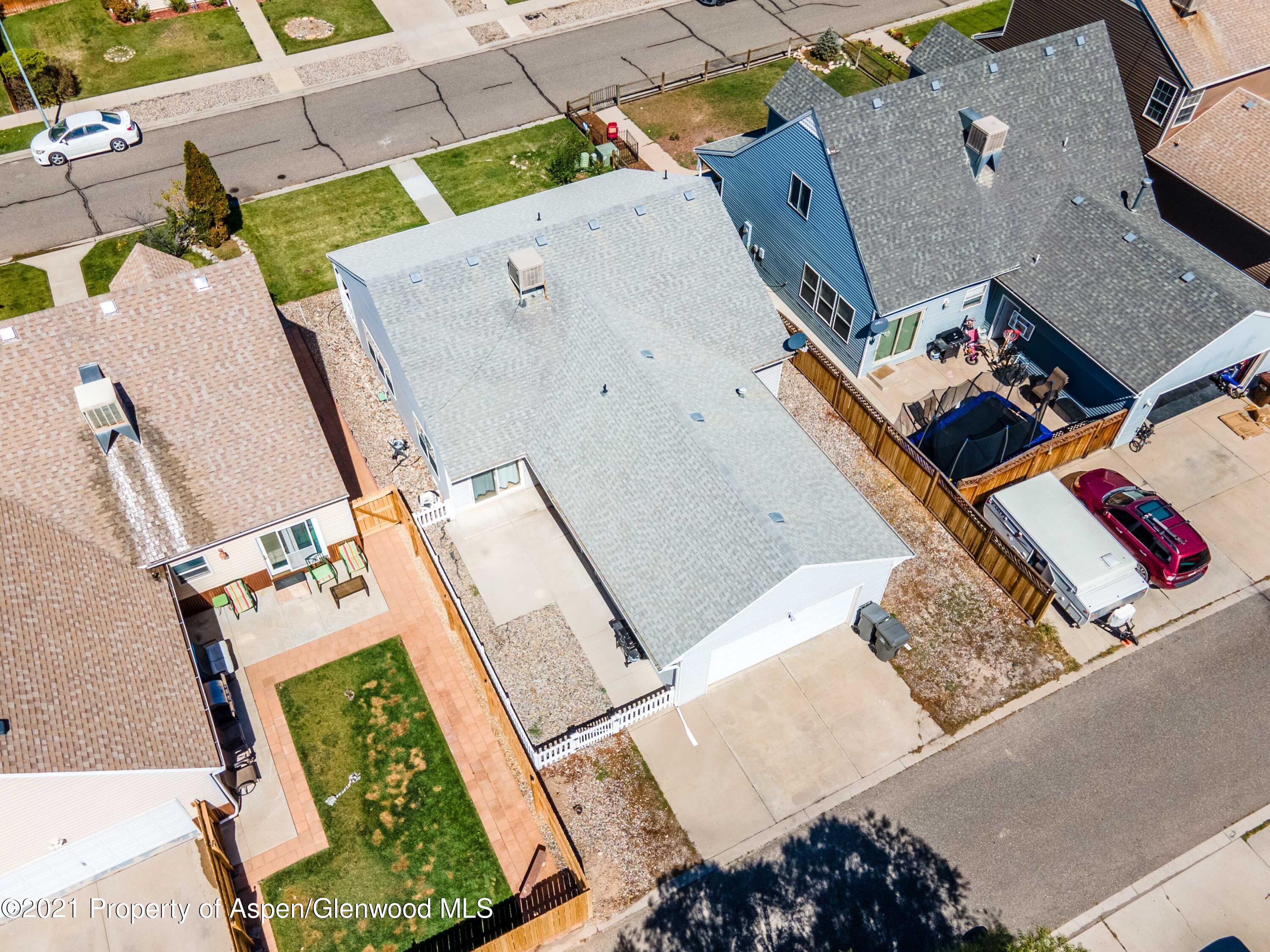 447 Columbine Drive Rifle, CO 81650 - Photo 35 of 36 an aerial view of a house with a yard