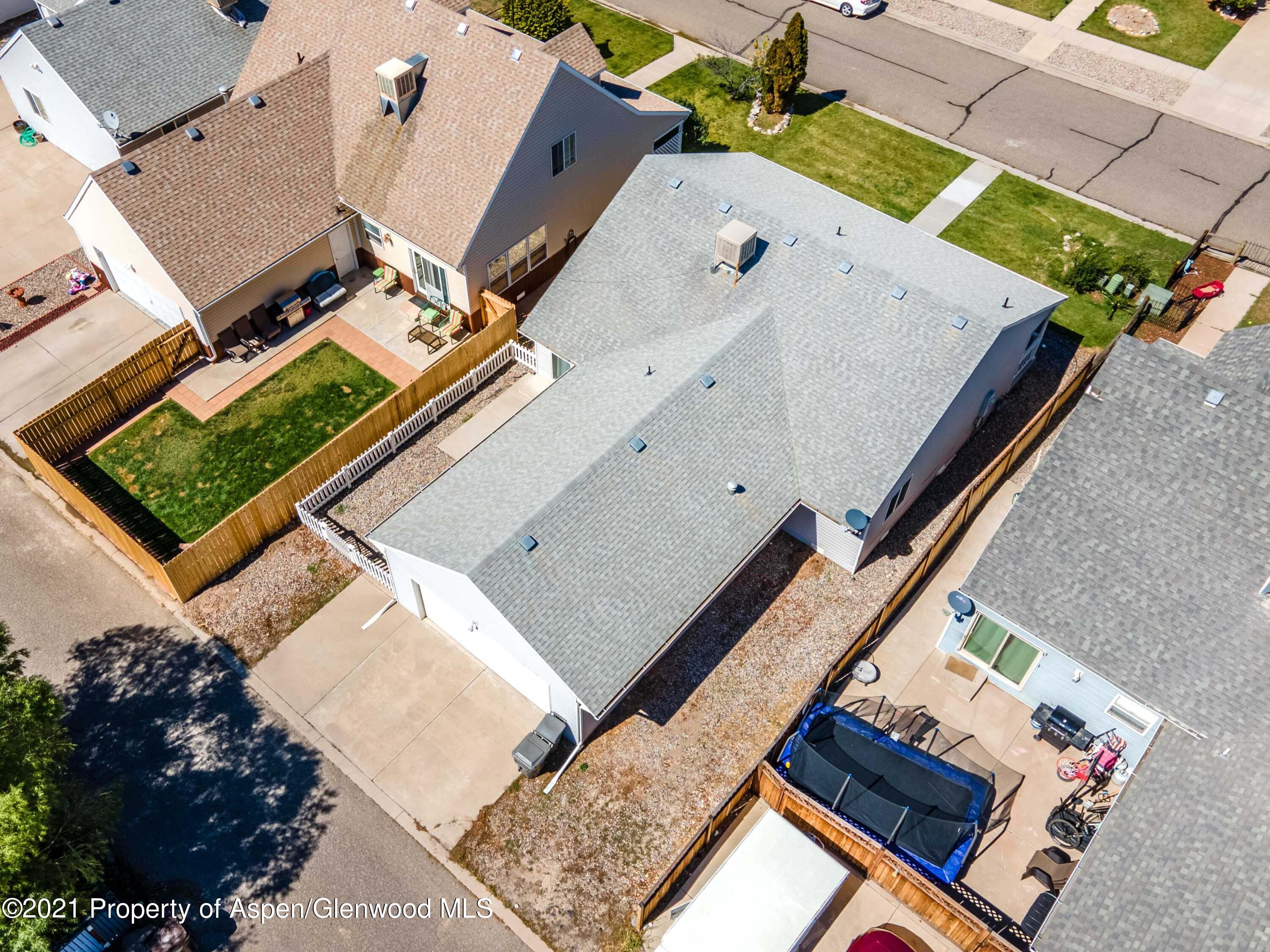 447 Columbine Drive Rifle, CO 81650 - Photo 36 of 36 an aerial view of a house with a yard