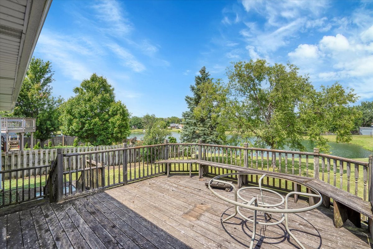 616 Rockhurst Road Bolingbrook, IL 60440 - Photo 32 of 37 a view of a balcony with wooden floor and fence