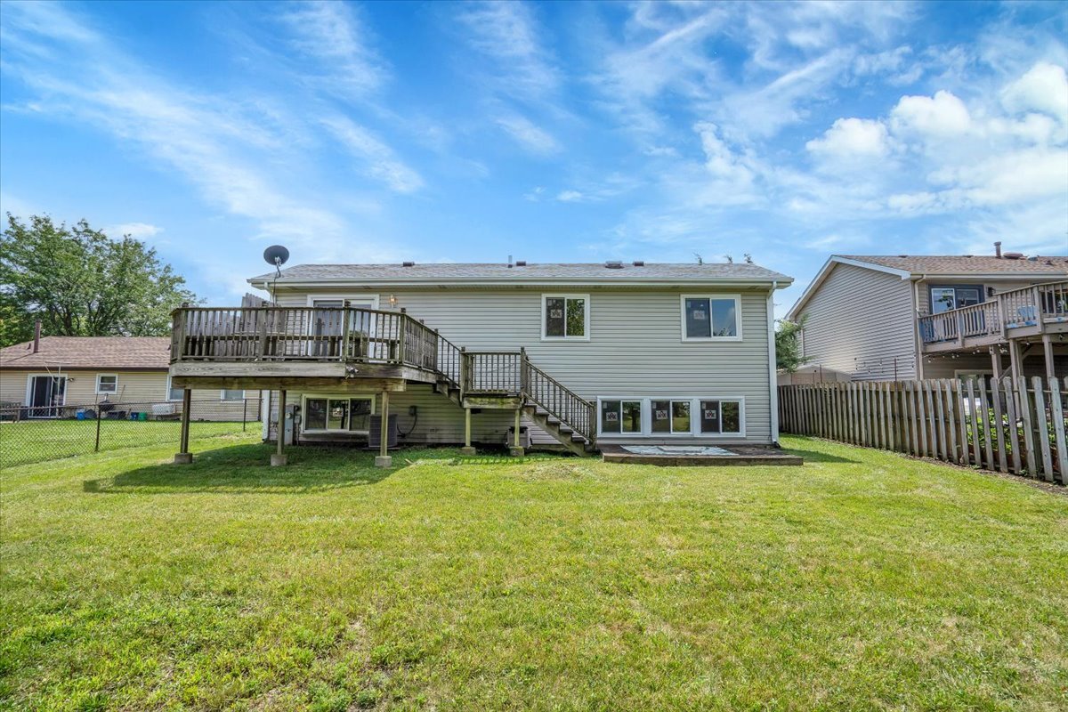 616 Rockhurst Road Bolingbrook, IL 60440 - Photo 35 of 37 a view of a house with backyard porch and sitting area