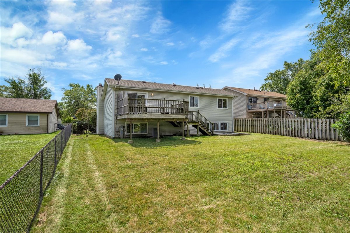 616 Rockhurst Road Bolingbrook, IL 60440 - Photo 36 of 37 a view of a house with pool and a yard