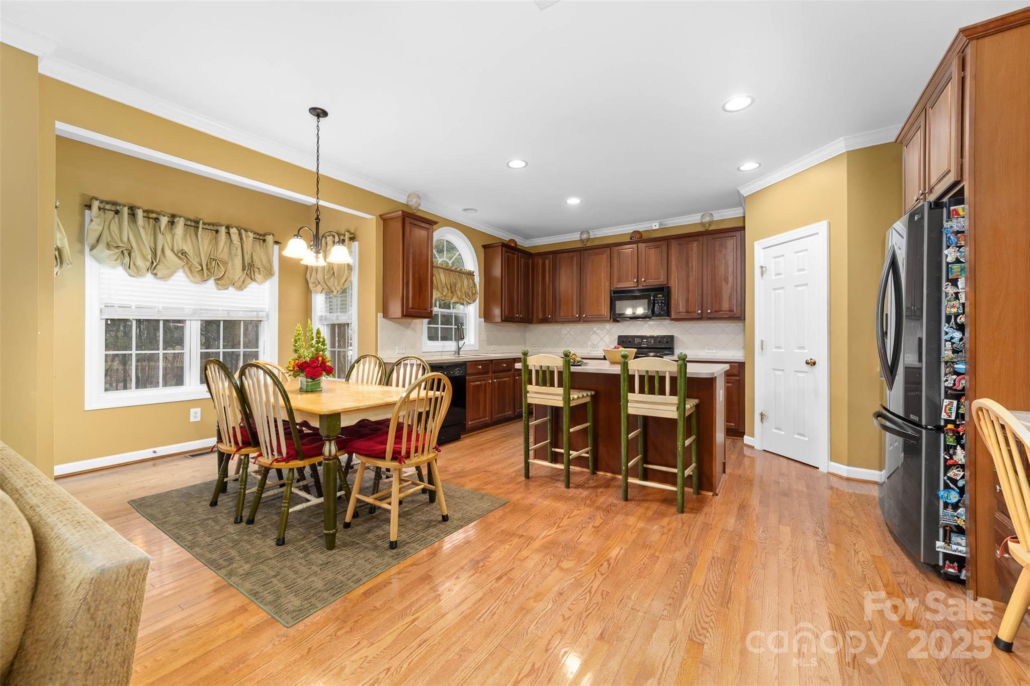 1728 Copperplate Road Charlotte, NC 28262 - Photo 12 of 36 a view of a dining room with furniture window and outside view