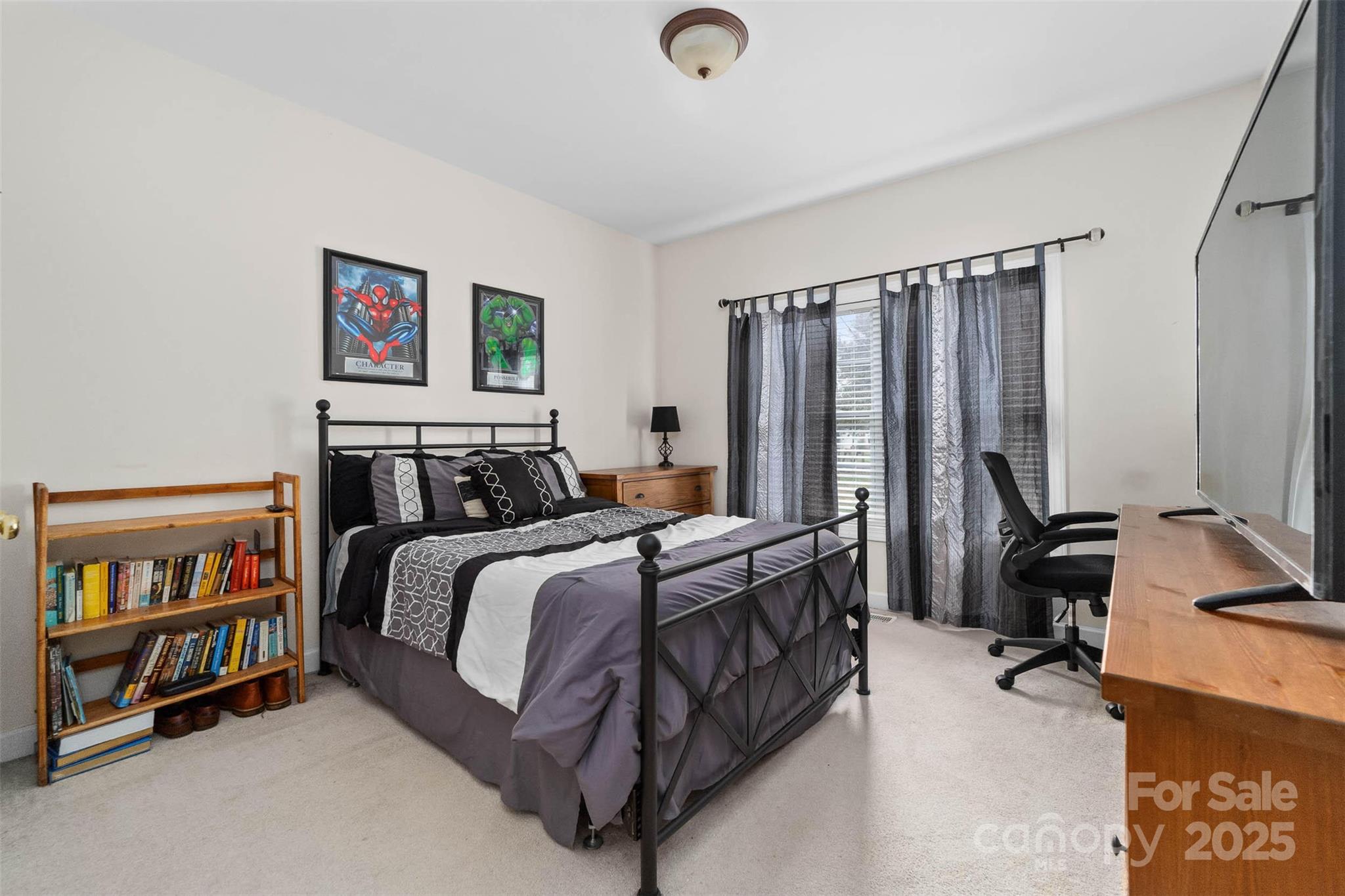 1728 Copperplate Road Charlotte, NC 28262 - Photo 19 of 36 a bedroom with a bed furniture and a window