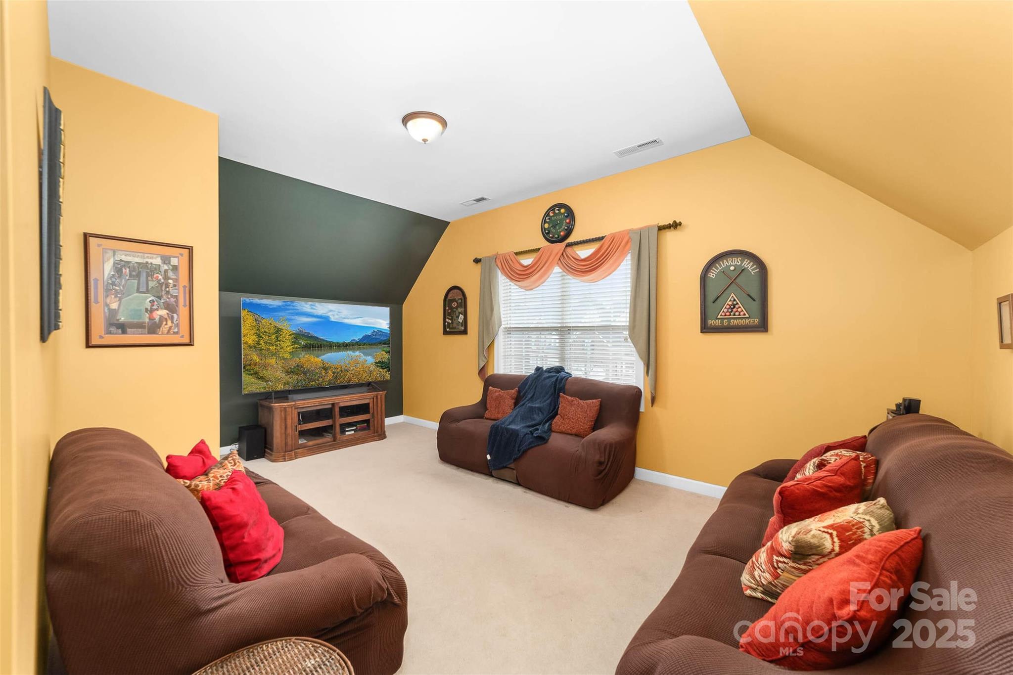 1728 Copperplate Road Charlotte, NC 28262 - Photo 28 of 36 a living room with furniture and a flat screen tv