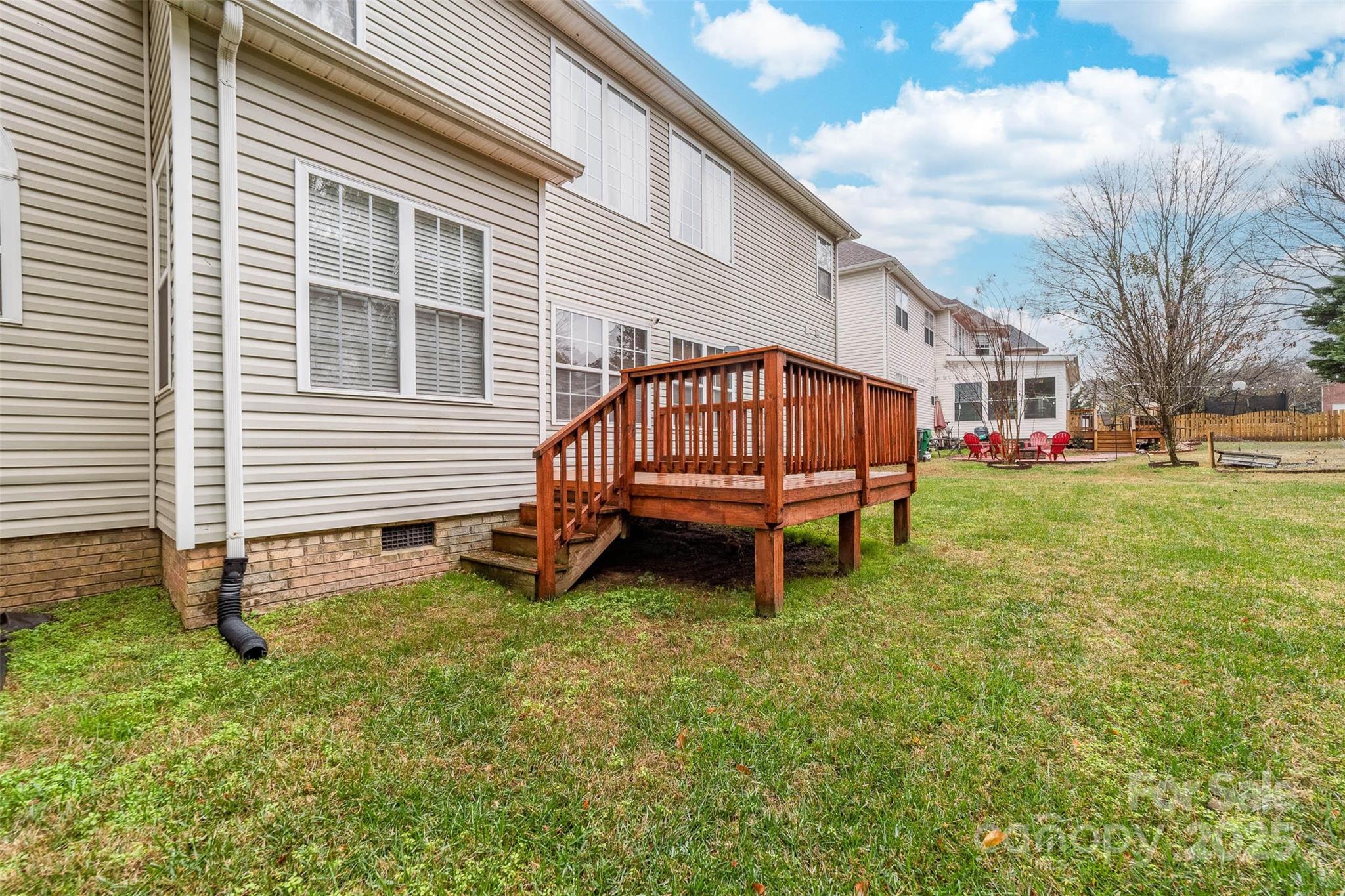 1728 Copperplate Road Charlotte, NC 28262 - Photo 35 of 36 a view of a house with a yard