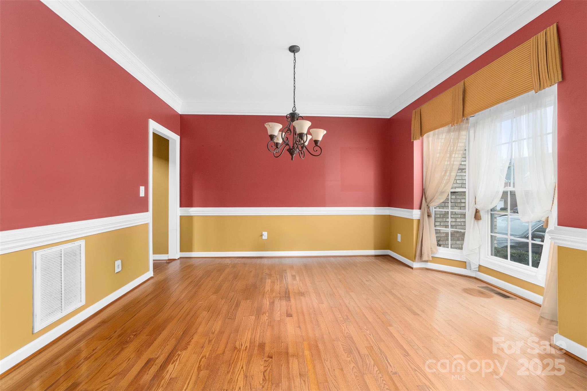 1728 Copperplate Road Charlotte, NC 28262 - Photo 7 of 36 a view of a room with wooden floor