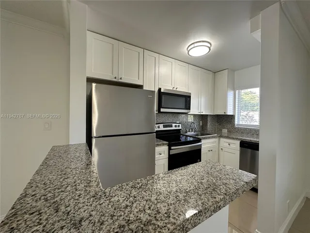 $1,595 | 1400 Northeast 56th Street, Unit 209, Fort Lauderdale, FL 33334