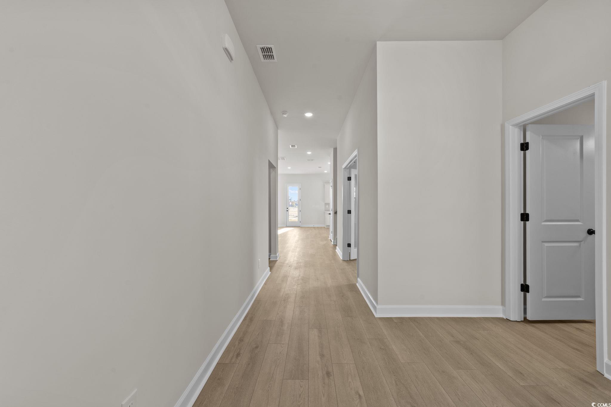 774 Ebb Tide Road Little River, SC 29566 - Photo 12 of 39 Aerial view of property and surrounding area featuring a nearby body of water and a highway