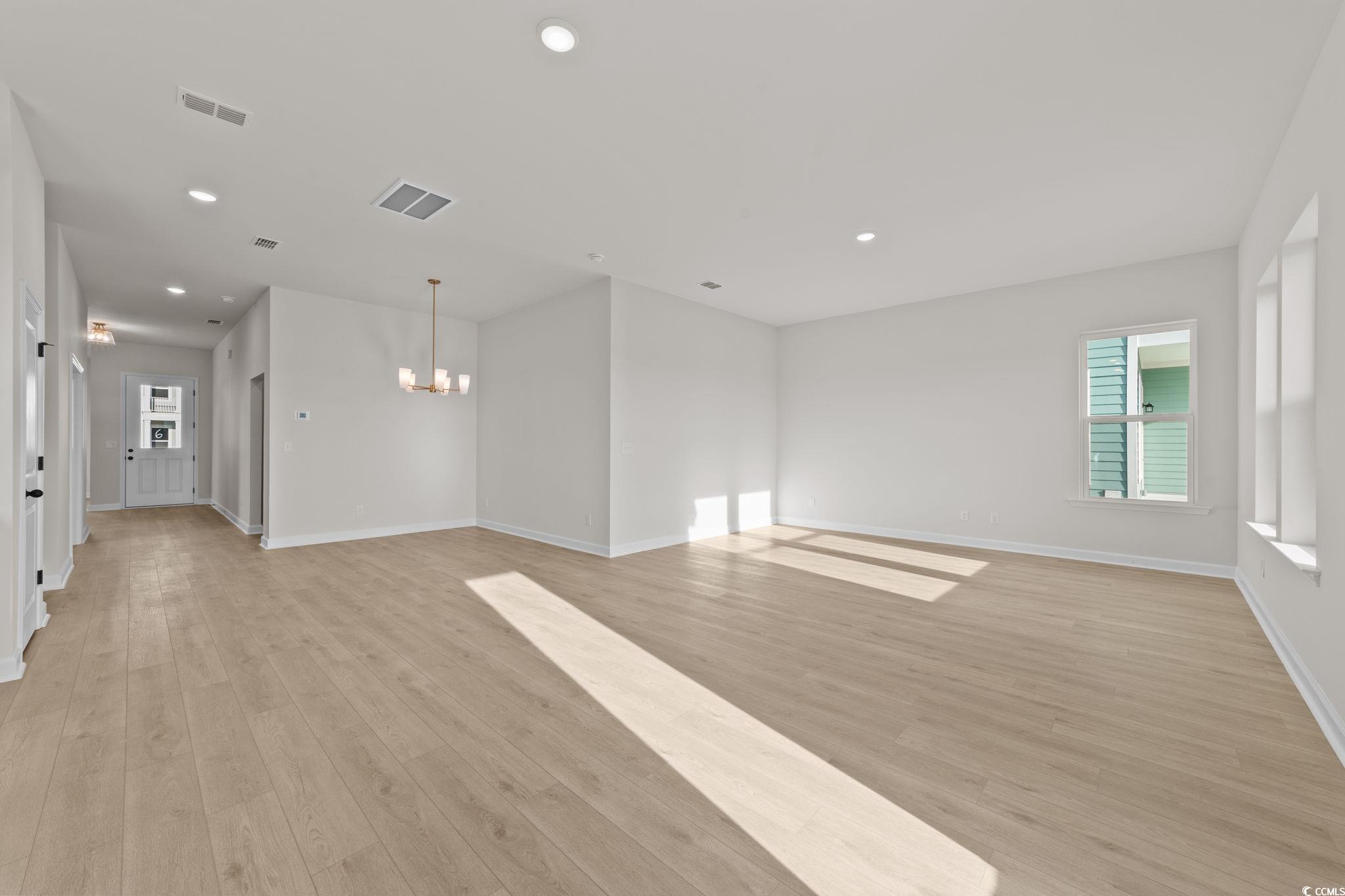 774 Ebb Tide Road Little River, SC 29566 - Photo 22 of 39 Spare room featuring light wood finished floors and recessed lighting