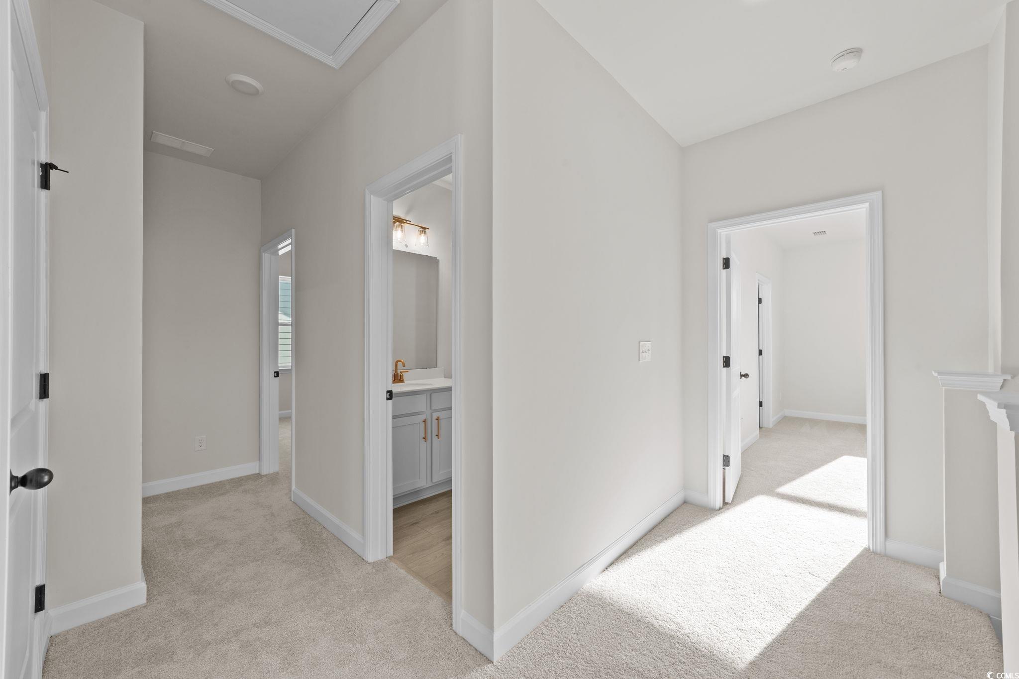774 Ebb Tide Road Little River, SC 29566 - Photo 24 of 39 Unfurnished living room with recessed lighting and light wood-style flooring