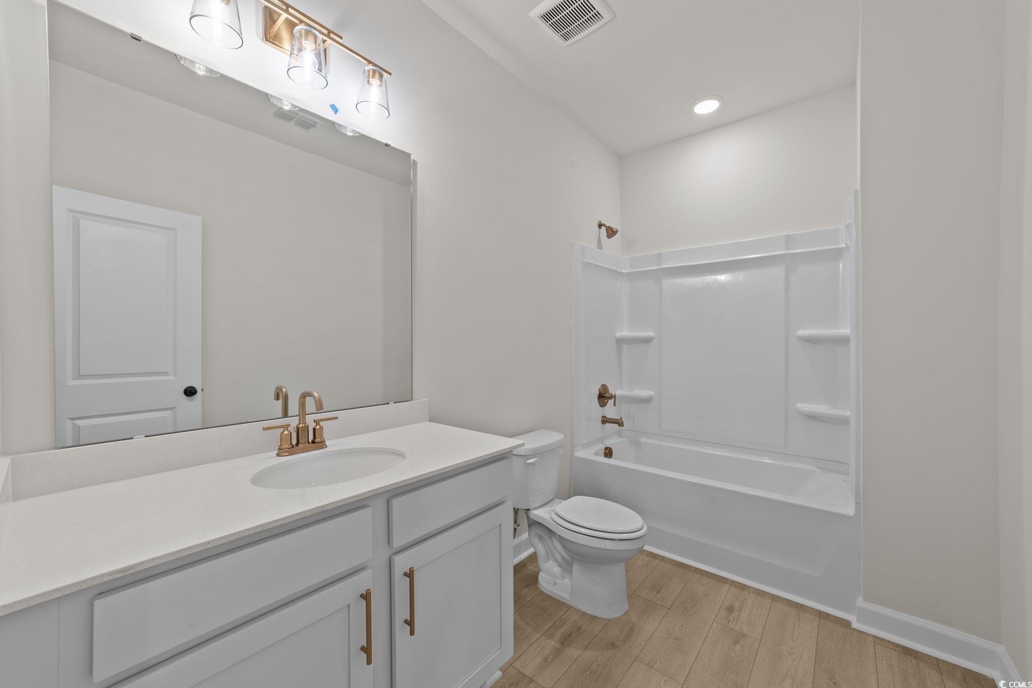 774 Ebb Tide Road Little River, SC 29566 - Photo 31 of 39 Full bath with vanity and shower / bathtub combination