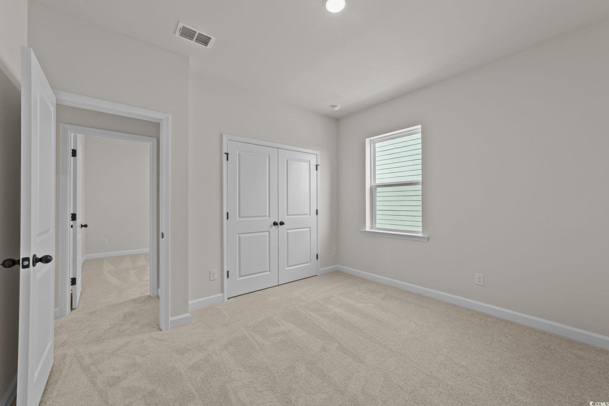 774 Ebb Tide Road Little River, SC 29566 - Photo 35 of 39 Carpeted spare room featuring baseboards and recessed lighting