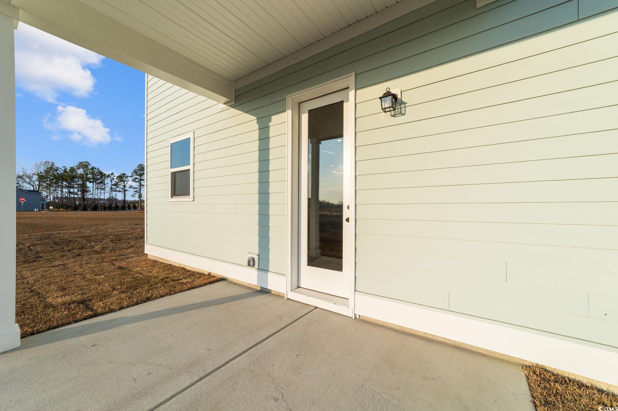 774 Ebb Tide Road Little River, SC 29566 - Photo 9 of 39 View of patio