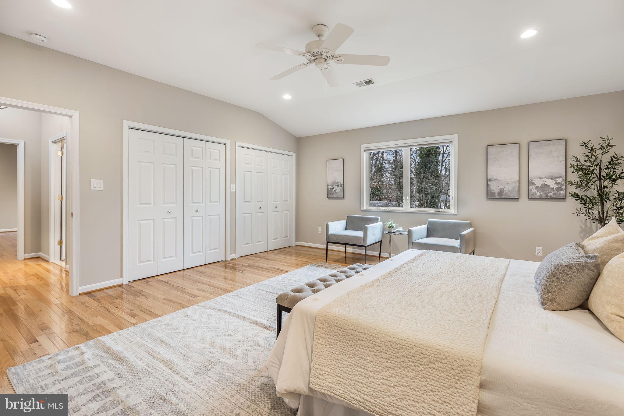 3103 Valley Lane Falls Church, VA 22044 - Photo 16 of 25 a bedroom with two beds and a chandelier