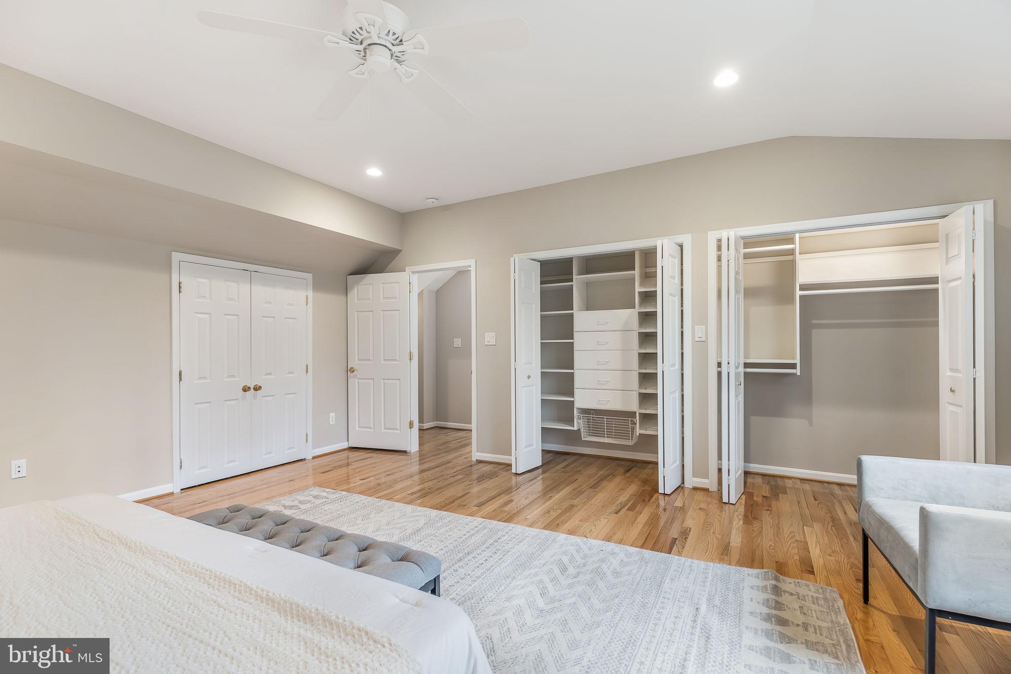 3103 Valley Lane Falls Church, VA 22044 - Photo 17 of 25 a spacious bedroom with a bed and a wooden floor
