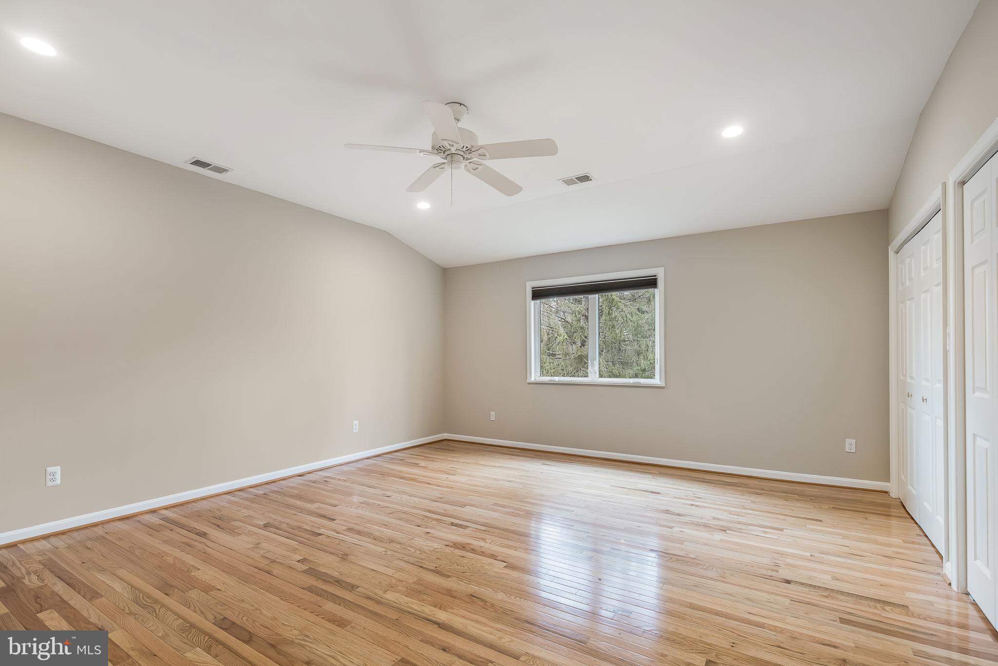 3103 Valley Lane Falls Church, VA 22044 - Photo 18 of 25 wooden floor in an empty room with a window