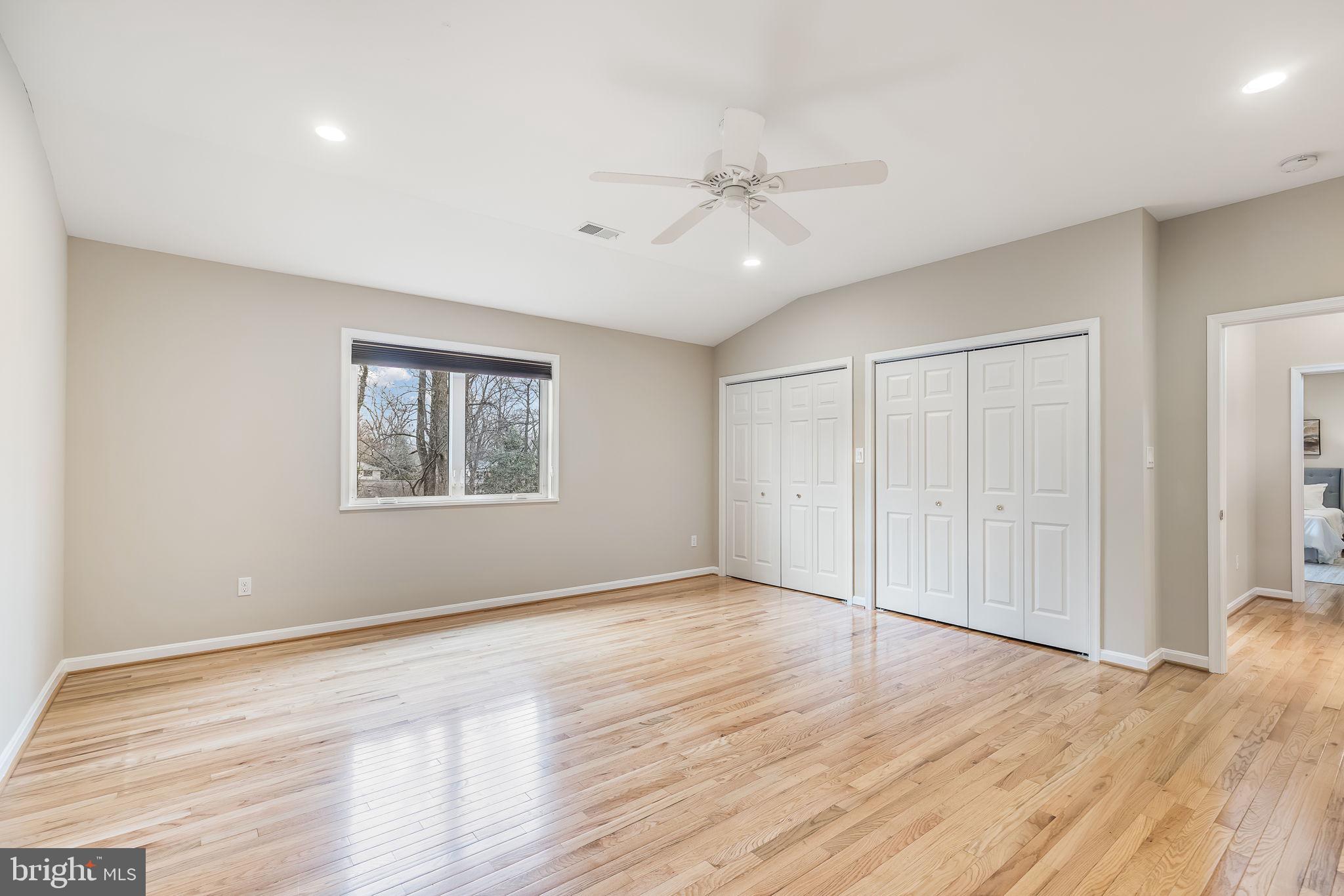3103 Valley Lane Falls Church, VA 22044 - Photo 19 of 25 a view of an empty room with wooden floor and a window