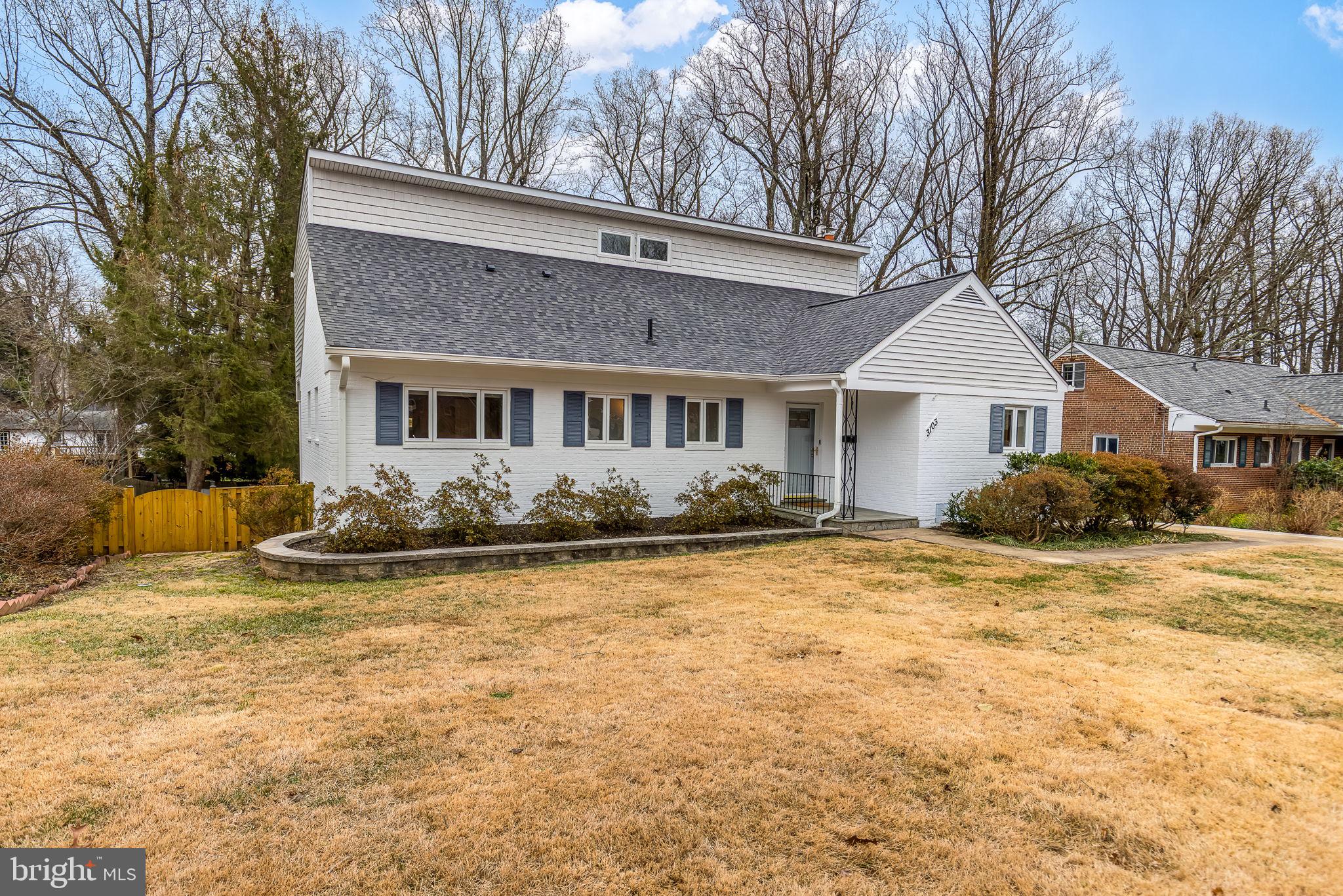 3103 Valley Lane Falls Church, VA 22044 - Photo 2 of 25 a view of a white house with a large tree in front of it