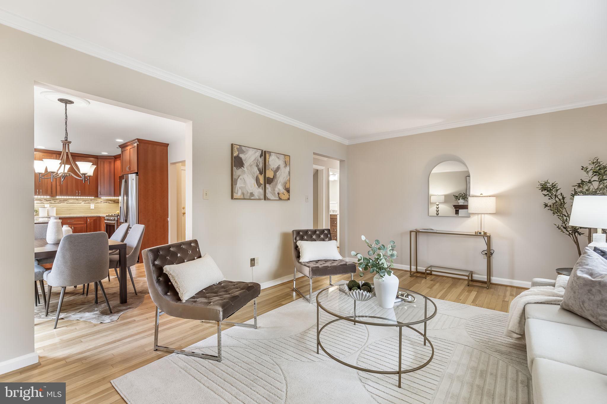 3103 Valley Lane Falls Church, VA 22044 - Photo 3 of 25 a living room with furniture a rug and a table