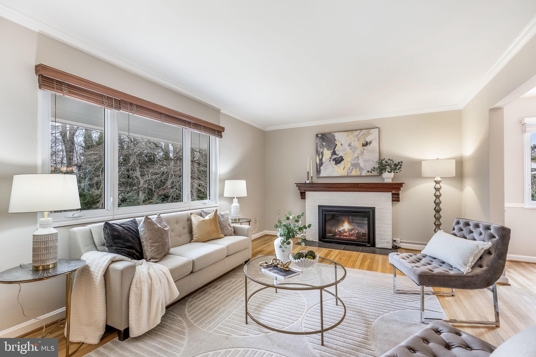 3103 Valley Lane Falls Church, VA 22044 - Photo 4 of 25 a living room with furniture and a fireplace