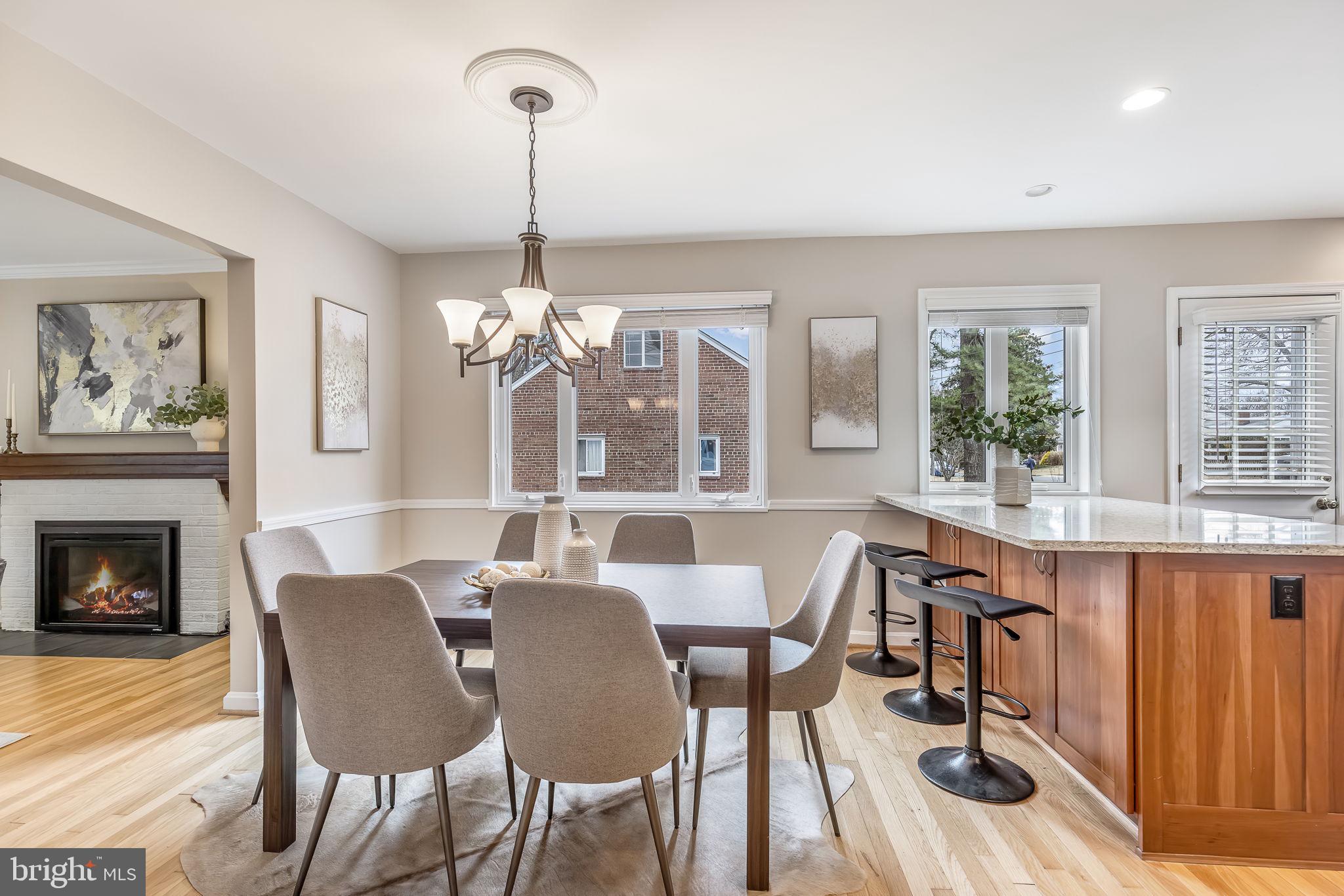 3103 Valley Lane Falls Church, VA 22044 - Photo 5 of 25 a view of a dining room with furniture window and wooden floor
