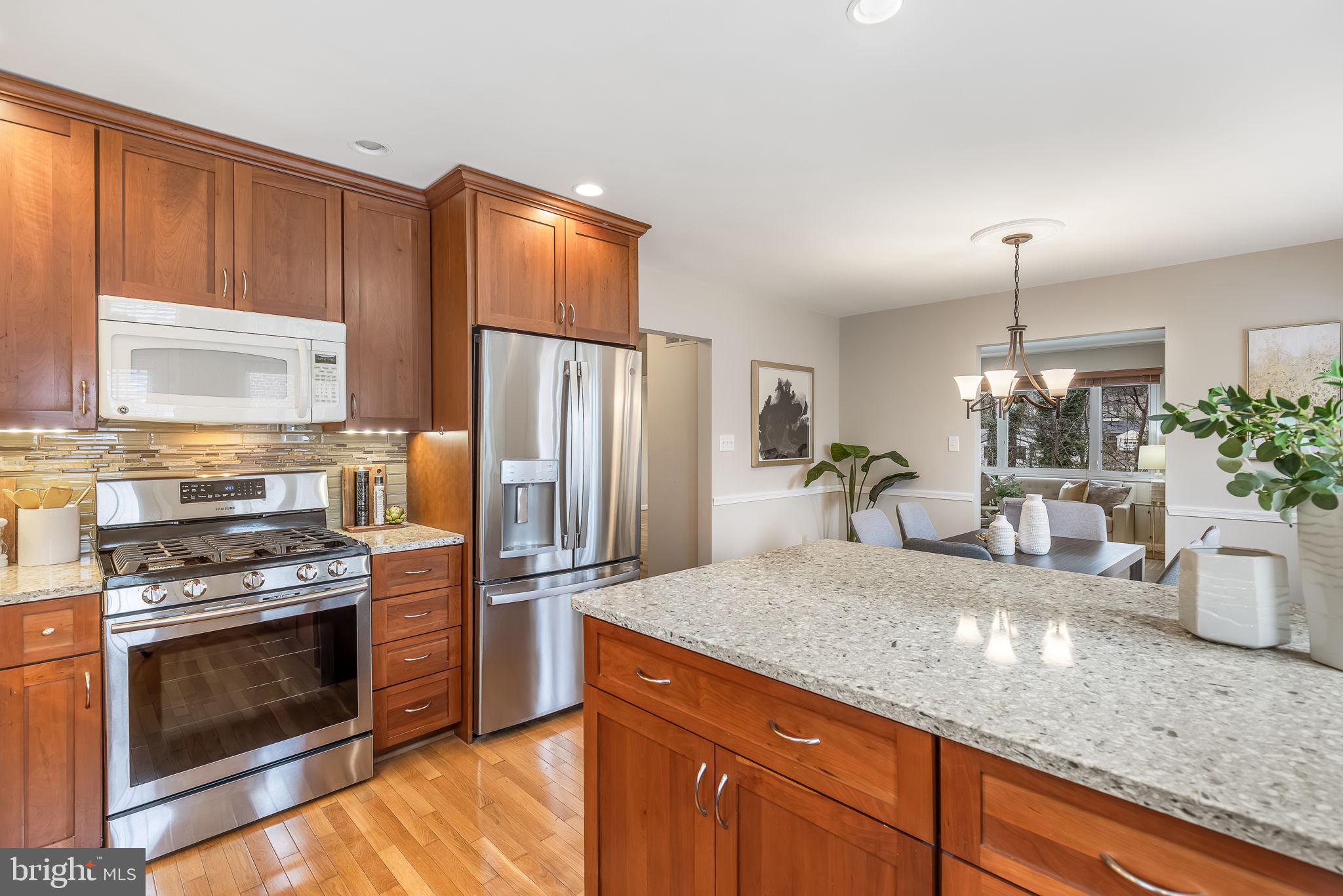 3103 Valley Lane Falls Church, VA 22044 - Photo 8 of 25 a kitchen with a refrigerator and a sink