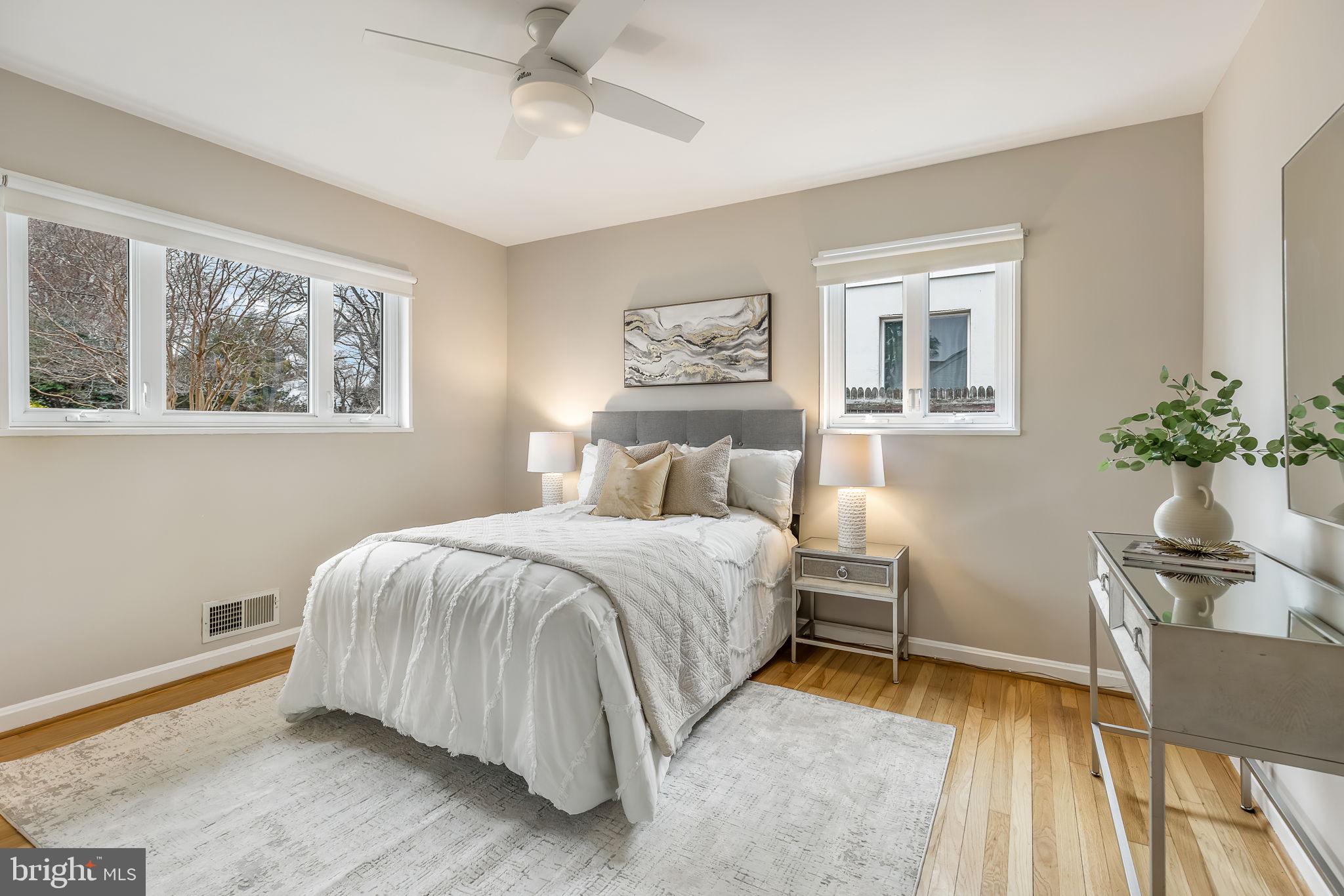 3103 Valley Lane Falls Church, VA 22044 - Photo 9 of 25 a bedroom with a bed and wooden floor