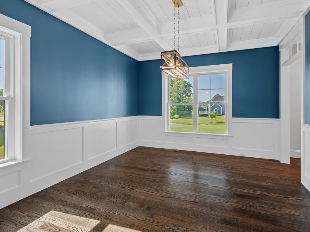 87 Brigham Hill Road Attleboro, MA 02703 - Photo 23 of 42 a view of an empty room with wooden floor and a window